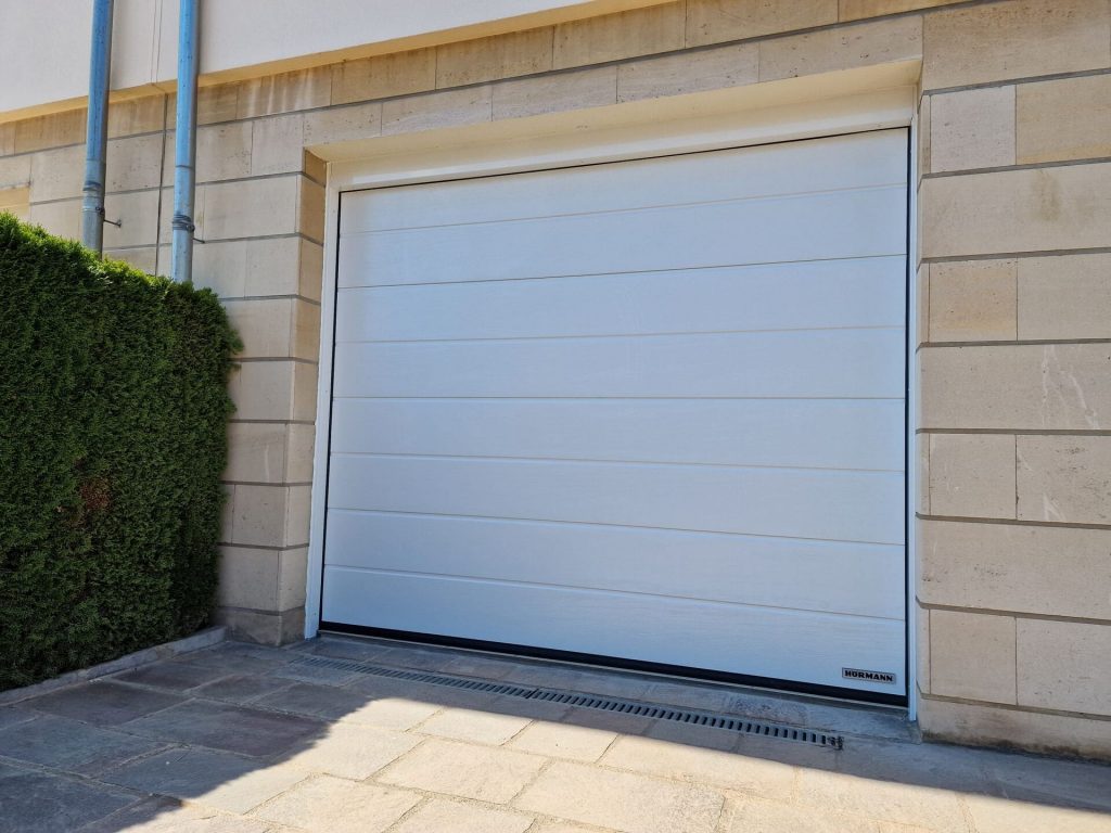 Réalisation porte de garage – Fermé-Lux Luxembourg